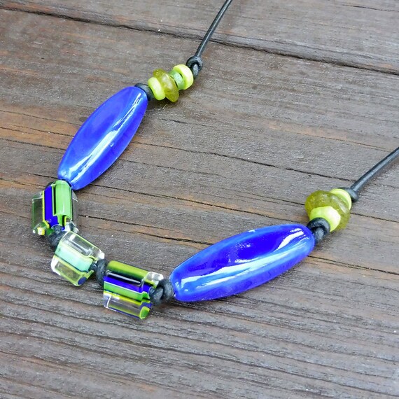 Cobalt Blue Tie Necklace - Cobalt Blue Ceramic Beads, Green Cane Glass Beads, Green Recycled Glass Beads, Black Leather Necklace