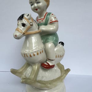 Porcelain figurine &quot;Boy on a horse&quot;. Polonsky porcelain factory Ukraine, USSR period, 60-70s. Series &quot;Children, happy childhood&quot;.