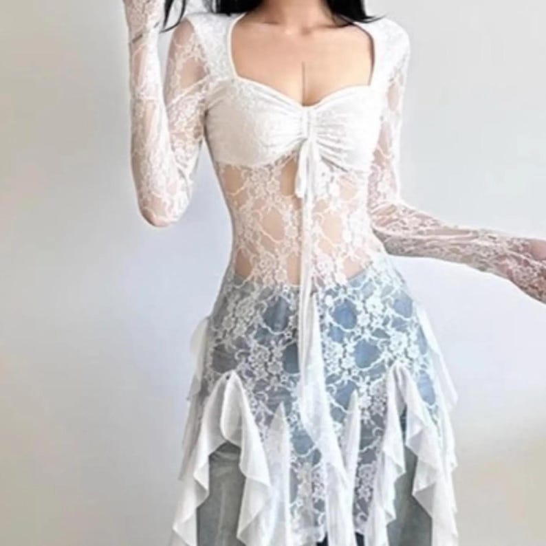 Women's Gothic Irregular Dress | Flare Sleeve Alternative Fashion | Neckline Asymmetrical Hem Dress | Gift For Her
.
Women’s gothic lace dress with sweetheart neckline, flare sleeves, and high-low hemline, styled with knee-high boots for a dramatic alternative fashion look.