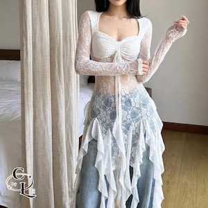 Women's Gothic Irregular Dress | Flare Sleeve Alternative Fashion | Neckline Asymmetrical Hem Dress | Gift For Her
.
Women’s gothic lace dress with sweetheart neckline, flare sleeves, and high-low hemline, styled with knee-high boots for a dramatic alternative fashion look.