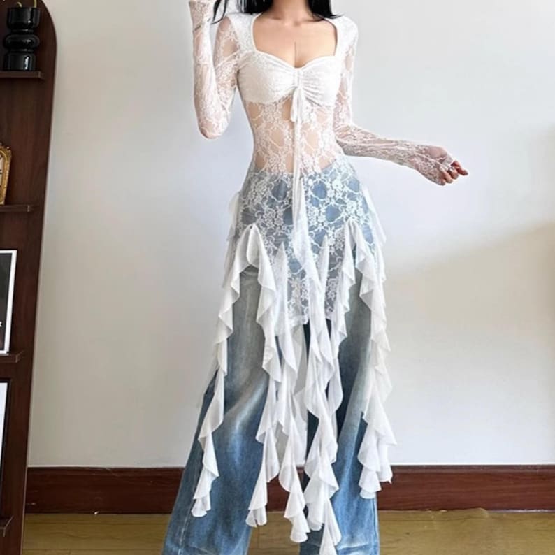 Women's Gothic Irregular Dress | Flare Sleeve Alternative Fashion | Neckline Asymmetrical Hem Dress | Gift For Her
.
Women’s gothic lace dress with sweetheart neckline, flare sleeves, and high-low hemline, styled with knee-high boots for a dramatic alternative fashion look.