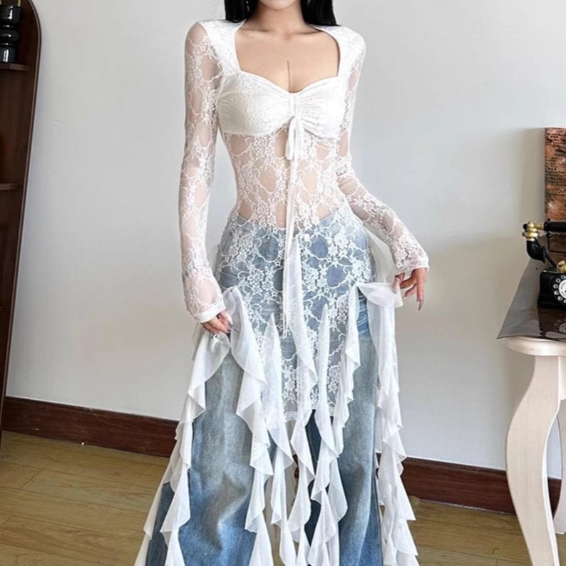 Women's Gothic Irregular Dress | Flare Sleeve Alternative Fashion | Neckline Asymmetrical Hem Dress | Gift For Her
.
Women’s gothic lace dress with sweetheart neckline, flare sleeves, and high-low hemline, styled with knee-high boots for a dramatic alternative fashion look.