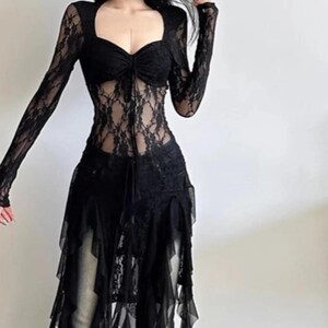 Women's Gothic Irregular Dress | Flare Sleeve Alternative Fashion | Neckline Asymmetrical Hem Dress | Gift For Her
.
Women’s gothic lace dress with sweetheart neckline, flare sleeves, and high-low hemline, styled with knee-high boots for a dramatic alternative fashion look.