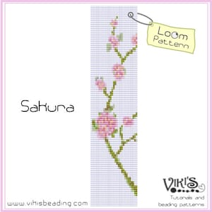 May include: A loom pattern for a beaded bracelet featuring a pink and green Sakura flower design. The pattern is titled "Sakura" and includes the text "Loom Pattern".
