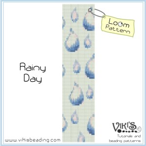 May include: A loom beading pattern for a bracelet with a rainy day theme. The pattern features a repeating design of blue raindrops on a white background. The text "Rainy Day" is visible at the top of the image. The text "Loom Pattern" is visible on a yellow tag.