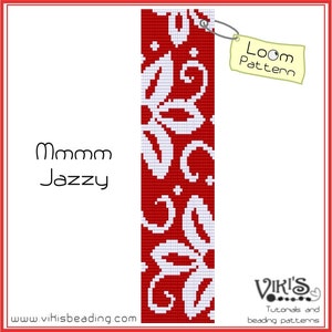 May include: A red and white loom beading pattern with a white floral design. The pattern is labeled "Mmmm Jazzy" and "Loom Pattern".