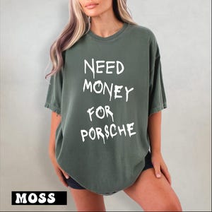a woman wearing a t - shirt that says need money for porsche