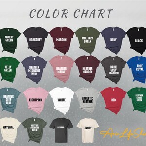 a collection of t-shirts in various colors and styles, arranged in a grid format.