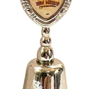 May include: Silver bell with a shield-shaped top featuring a yellow and red image of the state of New Mexico with the text "New Mexico Land of Enchantment".