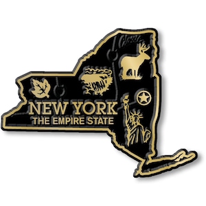 May include: A black and gold-colored New York state-shaped souvenir with the text "NEW YORK THE EMPIRE STATE". The design includes gold-colored images of a leaf, mountains, a deer, a star, and the Statue of Liberty.