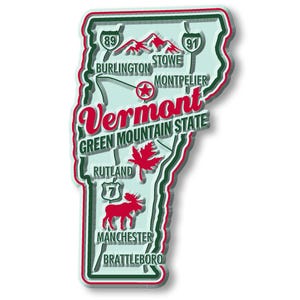 May include: A Vermont-shaped magnet with a pale blue background and a red and green border. The magnet features the state's name in red script, along with illustrations of a moose, a maple leaf, and mountain ranges. The text "Green Mountain State" is also included.