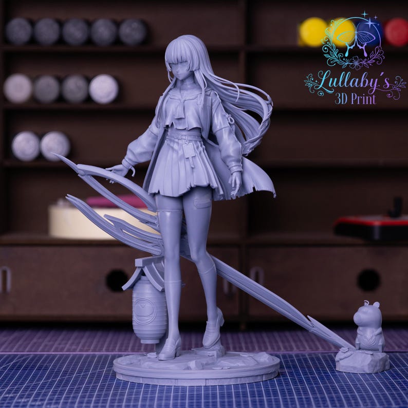 May include: A light gray 3D-printed figurine of a female anime character. The figure is wearing a short skirt, jacket, and boots, with long flowing hair. The figure is standing on a circular base with a lantern and a small animal figure. The Lullaby's 3D Print logo is in the background.