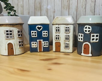 Calentador de cera derretida alberga piezas de arte de cerámica que adornan cualquier hogar