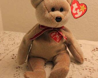 Ty Signature Bear 1999 – Brązowy pluszowy miś z czerwoną wstążką – kolekcja Beanie Babies