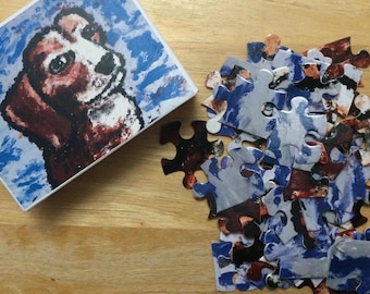 48-delige legpuzzel met schattige hond genaamd Penny erop. Wordt geleverd in een kleine kartonnen doos.