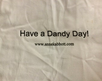 Small Tote Bag With Adorable Orange Tabby on Front And The Words “Have A Dandy Day” On The Back.