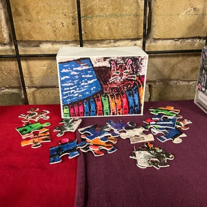 Puzzle De Un Gato Nombre Freda Con 48 Piezas En Caja De Cartón