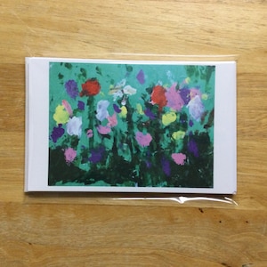 5 x 7 の空白のノートカード 5 枚と封筒。前面に美しい春の花が描かれています。