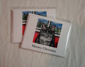 Make everyone smile with these two packages of five whimsical Christmas cards.  The cards are 4x6 inches and blank inside.