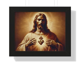 May include: Framed print of a religious figure with long hair and a beard, wearing a cream-coloured robe. A glowing heart is visible on the chest. The background features a radiant light emanating from behind the figure's head. The frame is black.
