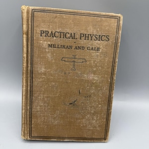 May include: A set of three ceramic mugs with a speckled, matte finish. The mugs are in shades of cream, light gray, and dark gray. Each mug has a simple, minimalist design and a rounded handle.