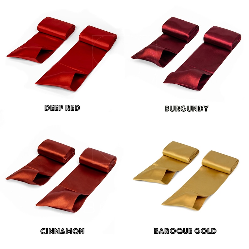 May include: Four sets of satin ribbon in deep red, burgundy, cinnamon, and baroque gold. Each set comprises two ribbons, with the colour names displayed below each set. The ribbons are rolled at one end and spread out at the other.