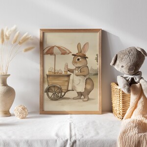 May include: A brown rabbit wearing a white apron and a hat stands behind a wooden ice cream cart with a red and white striped umbrella. The cart is filled with ice cream cones and the rabbit is holding a cone in its paw.