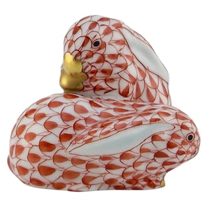 May include: A rustic wooden sign with the text "Welcome to our home" in white lettering. The sign features a distressed finish and a simple, inviting design, perfect for front door decor.