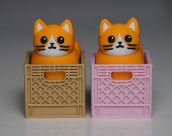 Juguete antiestrés con forma de gato naranja y clicker: ASMR para aliviar la ansiedad