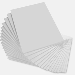 May include: A stack of white cardstock paper, fanned out to show the thickness of the paper.