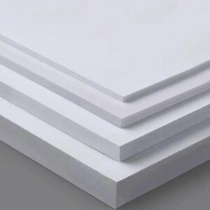 May include: Stack of four white foam core boards, each with a smooth, flat surface.
