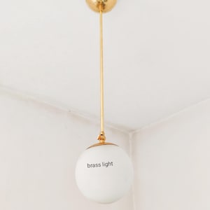 One globe lighting Mid century Modern pendant light ceiling light fixtures Antique Brass decor