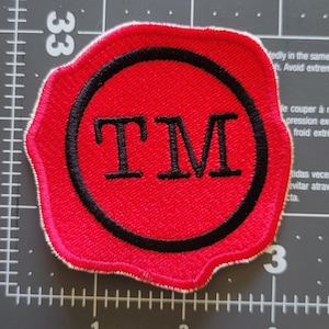 Łatka z pieczęcią lakową Taskmaster