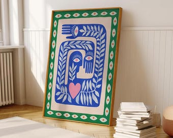 May include: A framed illustration of two stylized figures with blue bodies and pink eyes, embracing with a pink heart in the center. The figures are surrounded by green leaves and a green and orange border.