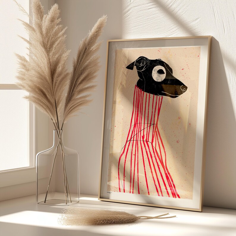 Puede incluir: Una ilustraci&oacute;n enmarcada de un perro blanco y negro con un su&eacute;ter a rayas rojas y blancas. El fondo es de color beige claro con salpicaduras rojas y blancas.