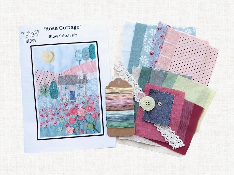 The instruction booklet, 7 colour threads, 15 coloured fabrics, base fabric, lace and 4 buttons you will receive