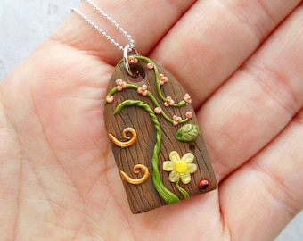 Fairy door pendant, handmade polymer clay fairytale pendant, flower fairy door, woodland pendant, whimsical, wooden fairy door, flower door