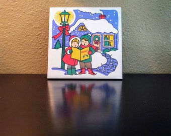 Vintage Christmas Carolers JSNY 1980s holiday Trivet hot plate made in Taiwan Free Shipping