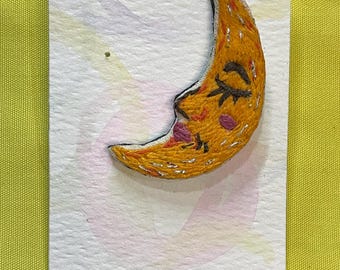 Hand-Embroidered Single Earring – Crescent Moon with a Playful Expression