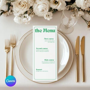 May include: A white menu card with a green title "the Menu" and a list of courses: First course, Second course, Main course, and Dessert. The menu is on a white table with gold silverware and a white plate.