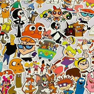 May include: A collection of colorful cartoon character stickers, featuring characters from various animated television shows. The stickers include characters like Dexter, the Powerpuff Girls, and characters from Adventure Time. The stickers are on a white background.