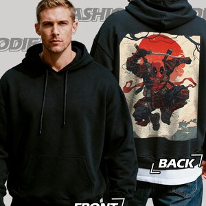 May include: Black hoodie with a front pocket and drawstring hood. The back features a graphic of a character in a samurai outfit with a red sun background. The words "FASHION HOODIE" are at the bottom.