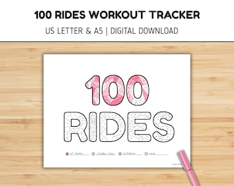 May include: A white workout tracker sheet with the text "100 RIDES WORKOUT TRACKER" in black. The numbers "100" and the word "RIDES" are in a pink and white geometric design. Includes options for tracking rides at home, studio class, outdoor, or race.