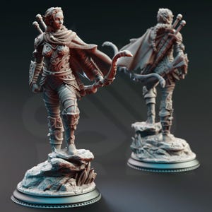 May include: A detailed figurine of a female archer in a fantasy setting. The figure is clad in ornate armor, holding a bow, and standing on a rocky base. A second figure is visible in the background. The color is a muted gray.