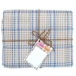 May include: A beige and blue canvas mesh wrapped in brown twine with a tag that reads "Color Crazy".