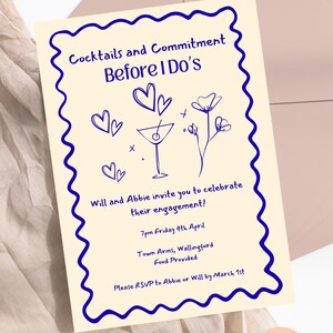 May include: A cream-colored engagement invitation card with a dark blue wavy border. The text reads Cocktails and Commitment Before I Do's, Will and Abbie invite you to celebrate their engagement, 7pm Friday 4th April, Town Arms, Wallingford, Food Provided, Please RSVP to Abbie or Will by March 1st, featuring line art of hearts, a martini glass, and flowers.