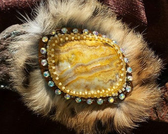 Native American made cuff bracelet, bead embroidered agate surrounded with fur