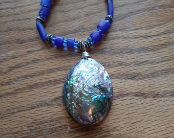 Indigenous made,  abalone shell pendant with rare blue Russian trade beads necklace.