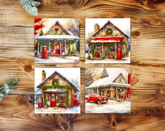 May include: Four watercolour prints depicting festive buildings decorated for Christmas. Each print shows a red door, a red petrol pump, and seasonal greenery. One print includes a red vintage car. The prints are on a wooden background.