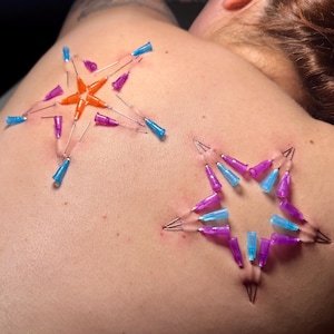 STARBABIES - Needle Play-piercingsjabloon